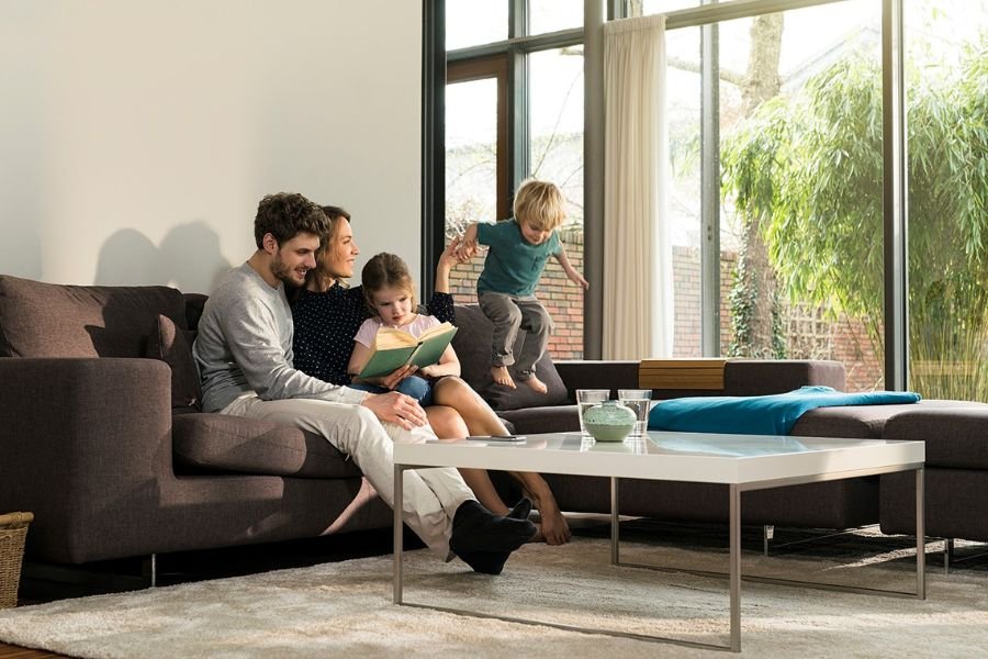 Family relaxing on luxury furniture