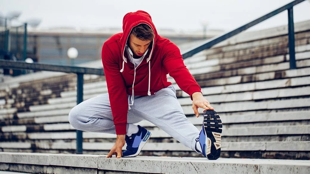 Man wearing essentials hoodie